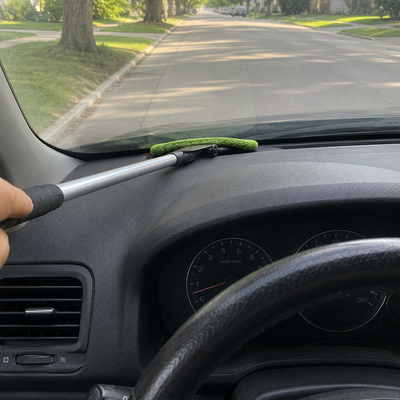 Reaches the impossible gap between dashboard and windshield
